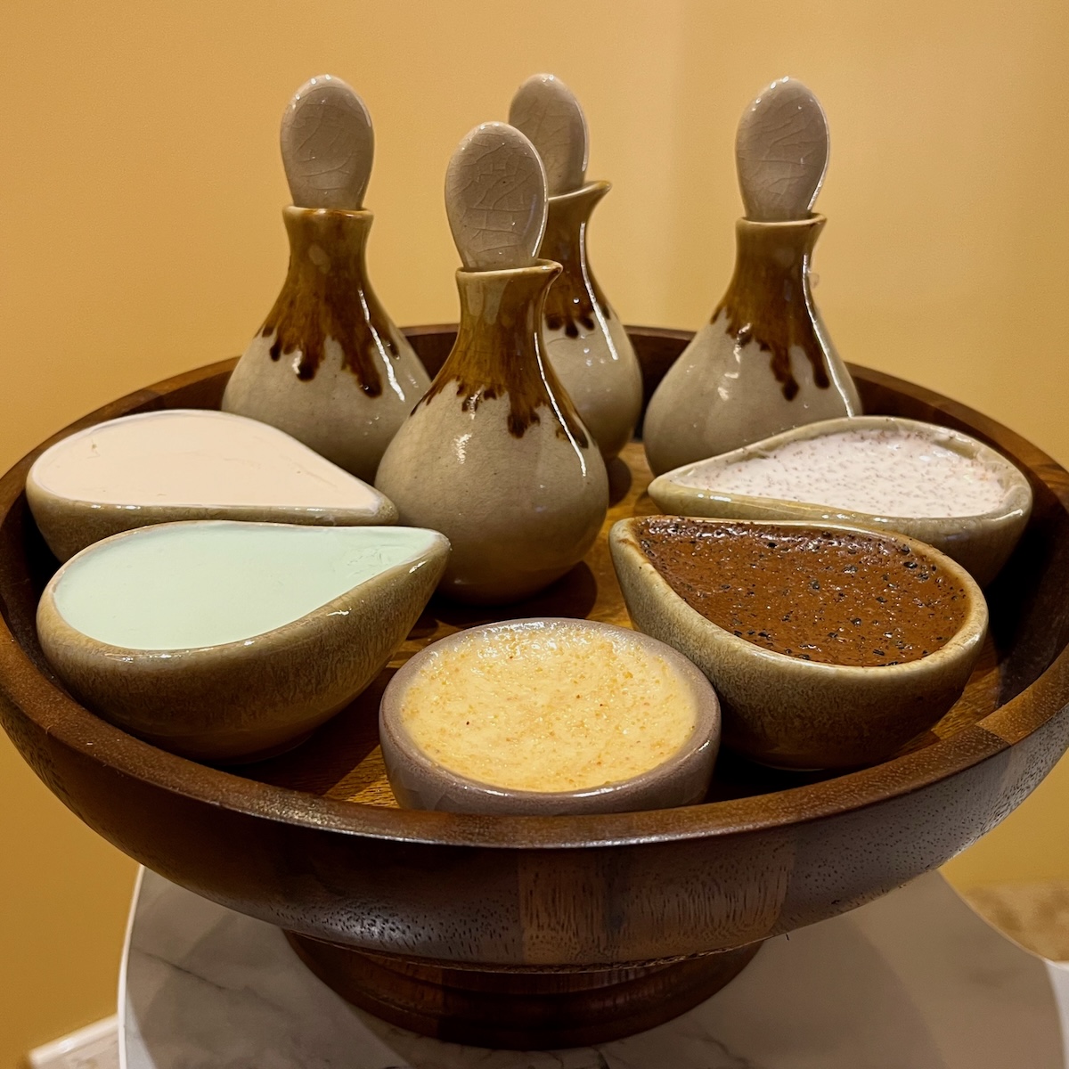 Your choice of aromatic oils and body scrubs. Enjoy Yenjai's spa wellness renewal alone or as a couple.